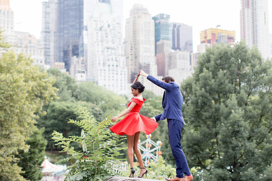 Couple shares a sweet moment in this Central Park engagement photo by NYC wedding photographer Amy Rizzuto