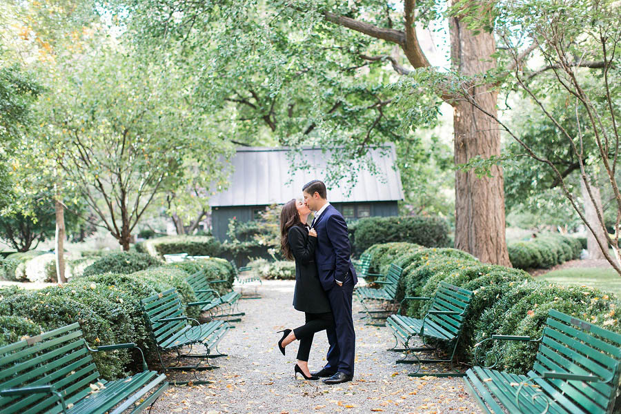Julia and Michael pose in Gramercy Park for their NYC engagement photos by NYC engagement photographer Amy Rizzuto of Amy Rizzuto Photography