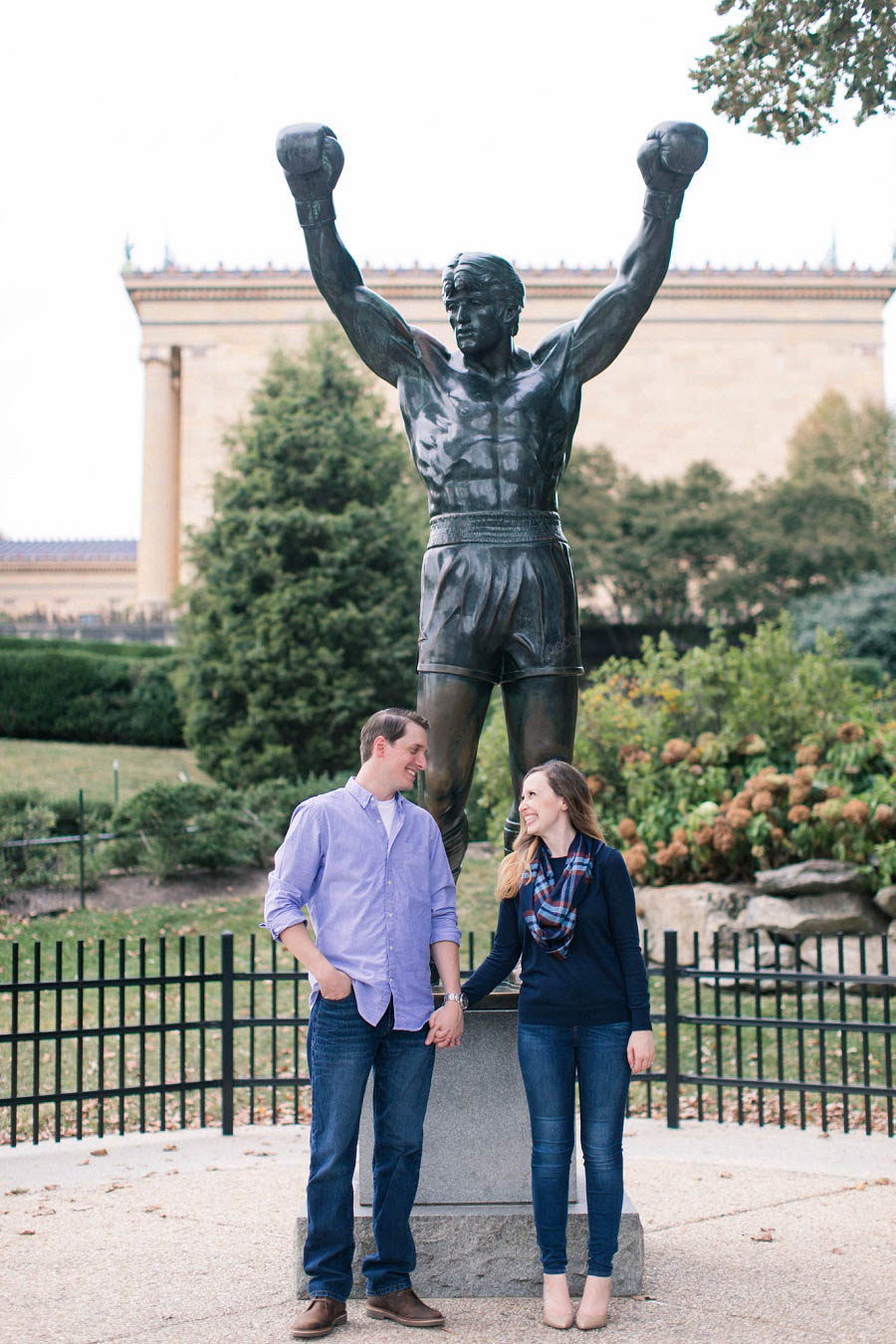 Old City Philadelphia engagement photo captured by Philadelphia engagement photographer Amy Rizzuto of Amy Rizzuto Photography on the Art Museum Steps at the Rocky statue