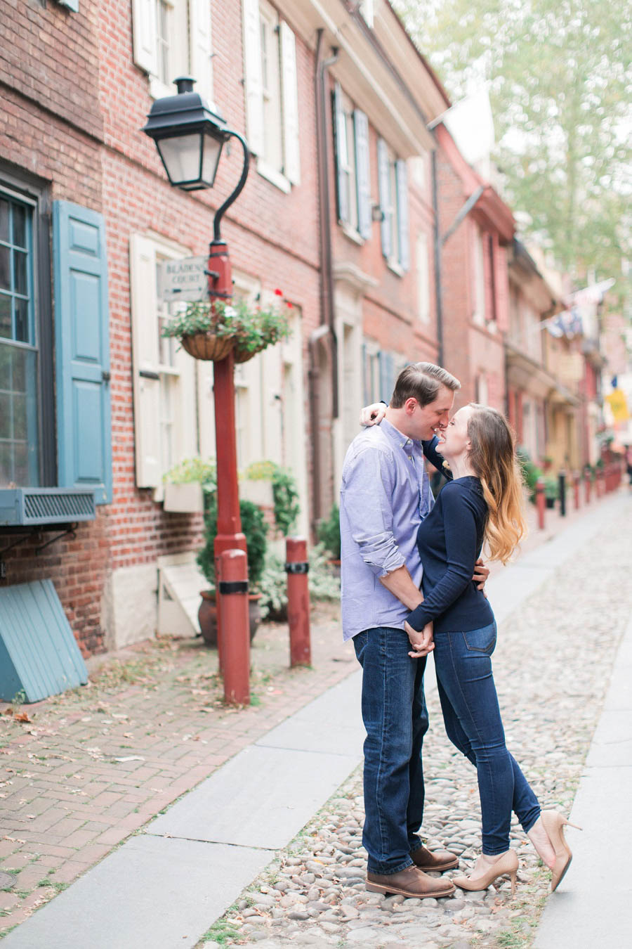 Old City Philadelphia engagement photo captured by Philadelphia engagement photographer Amy Rizzuto of Amy Rizzuto Photography in Elfreth's Alley