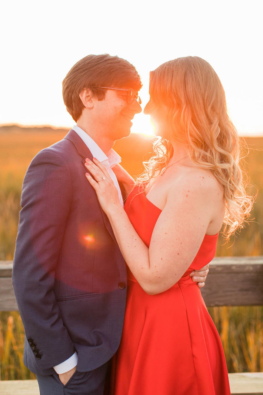 Beach engagement photo by Hamptons wedding photographer Amy Rizzuto Photography. Gorgeous Hamptons engagement photo at sunset.