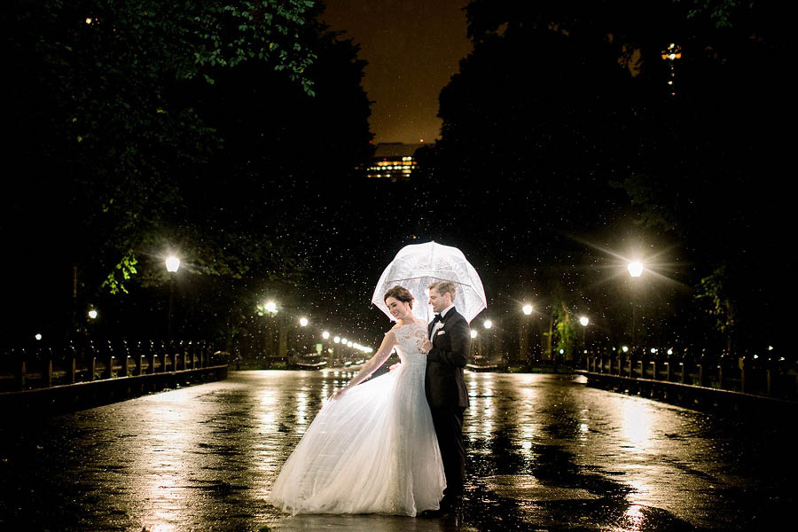 Central Park wedding photo backlit in the rain captured by Amy Rizzuto Photography