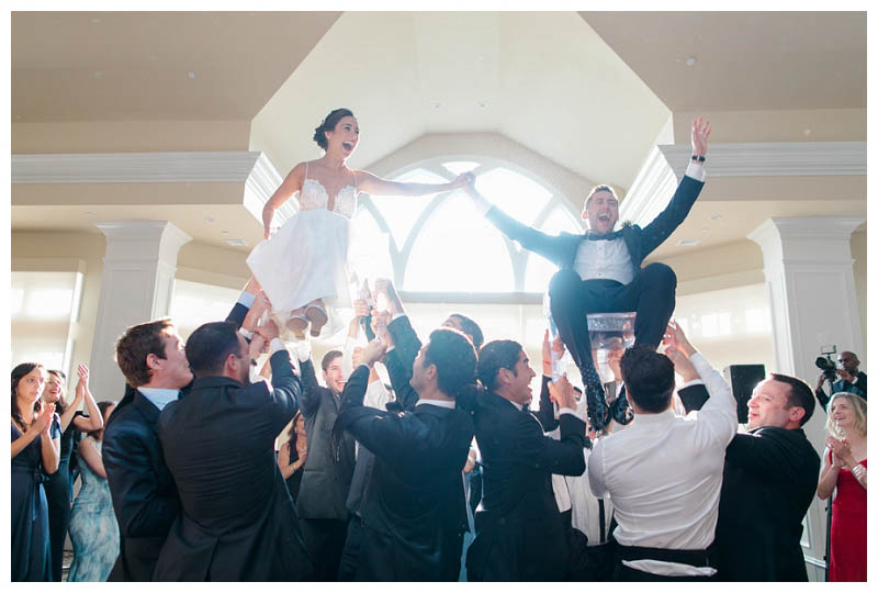 Hora dance at Jewish wedding at Le Chateau wedding captured by best NYC wedding photographer Amy Rizzuto Photography