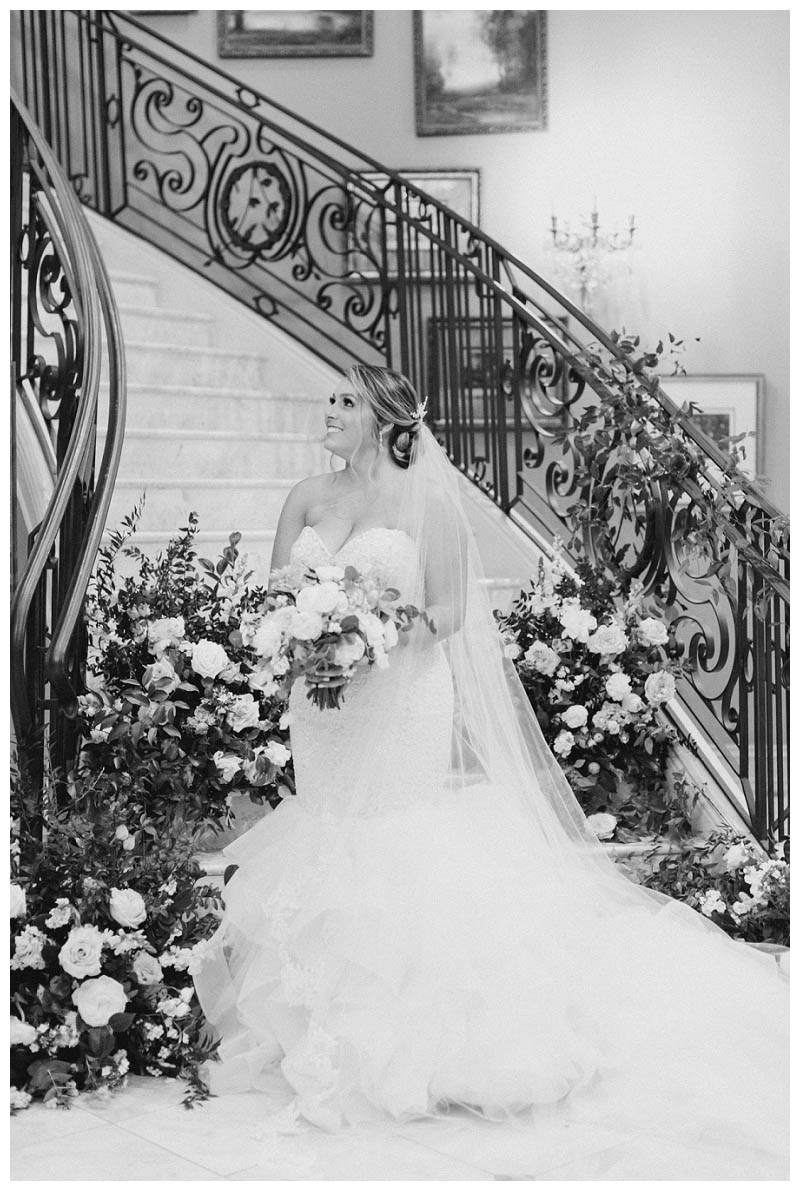 black and white bride on stairs