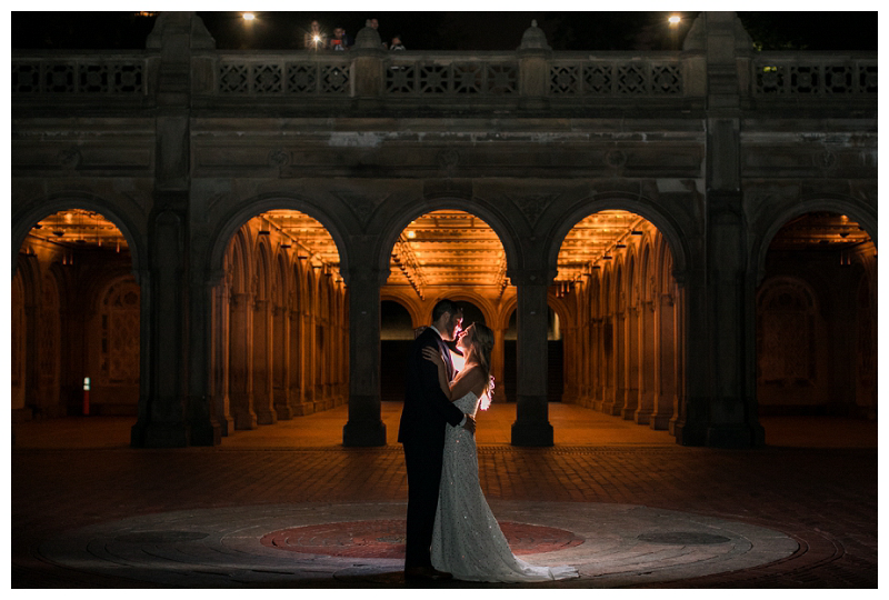 backlit nighttime central park wedding photo