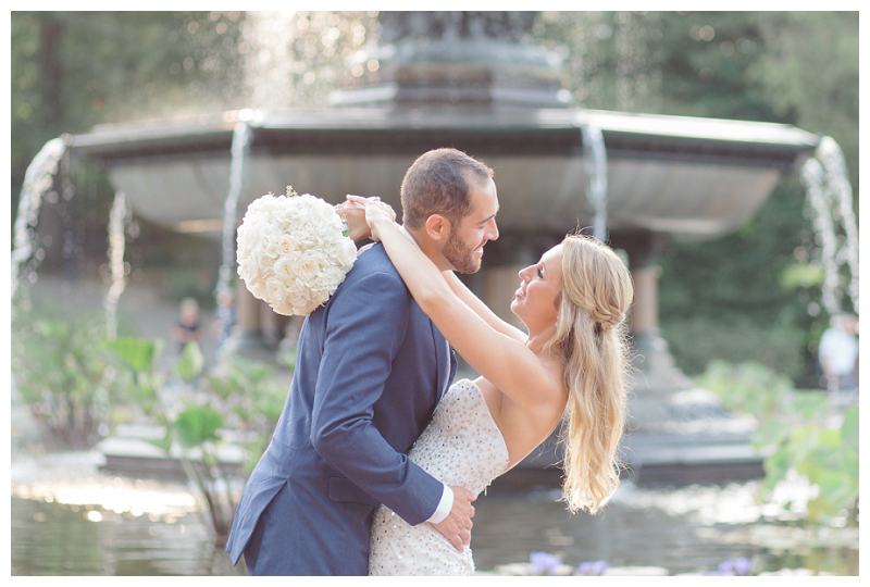 bride and groom at bethesda fountain captured by best central park boathouse wedding photographer amy rizzuto