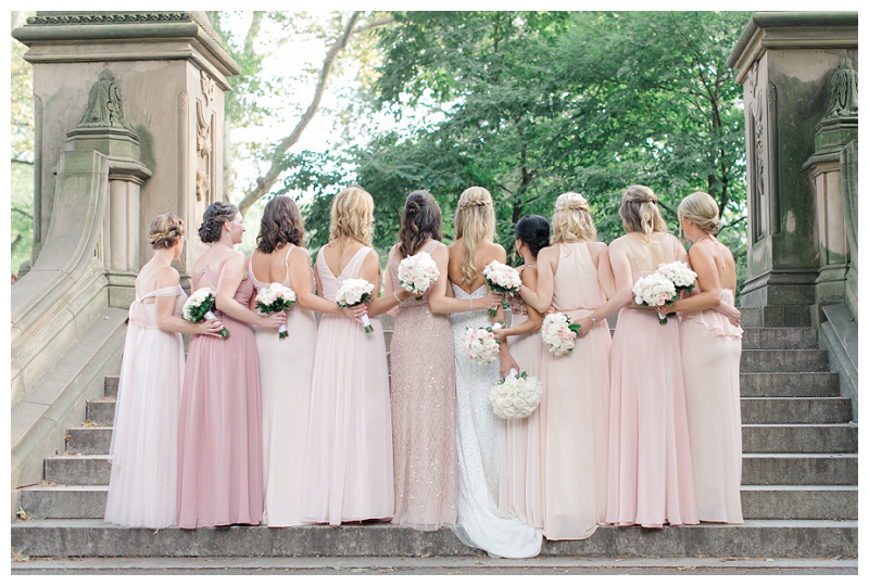 bridesmaids in mismatched pink dresses in central park