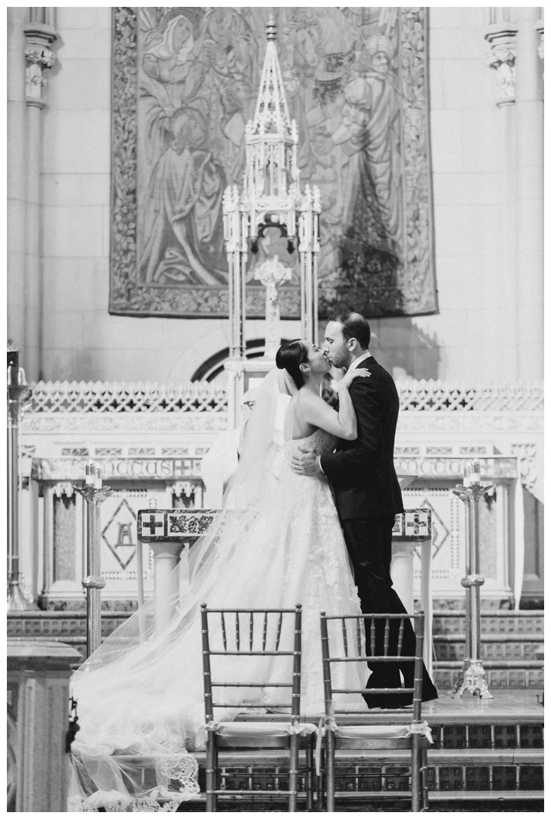 black and white first kiss photo from NYC winter wedding