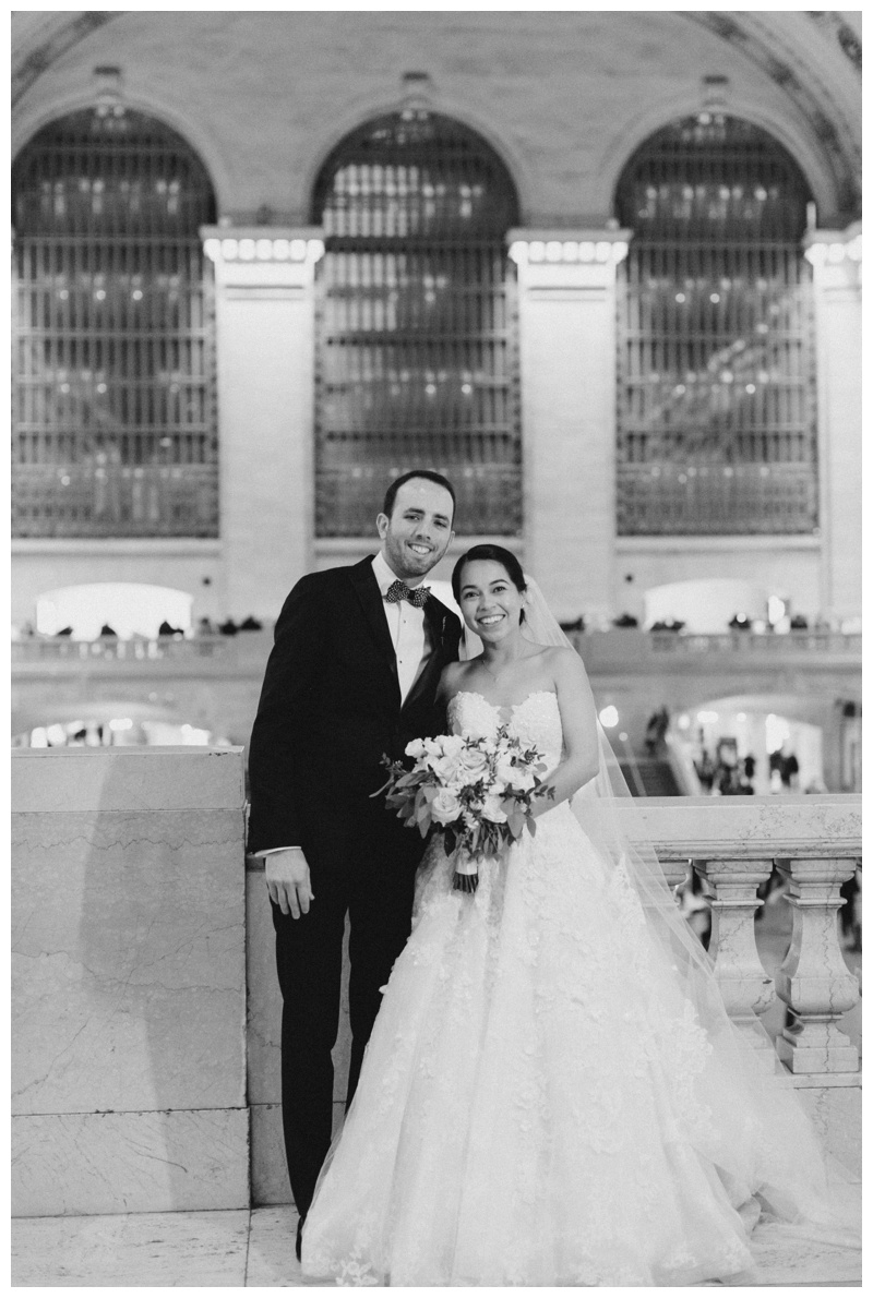 bride and groom in black and white grand central wedding photo