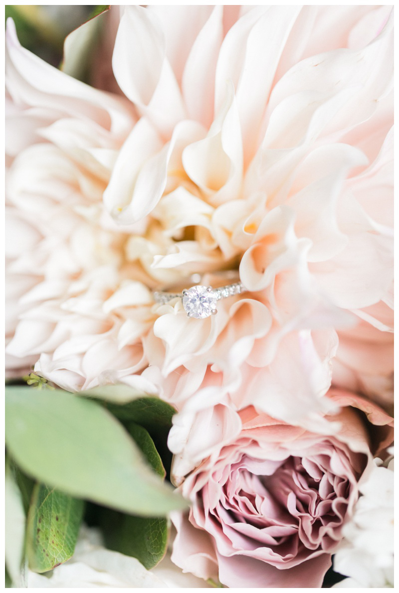 Engagement ring photo on bridal bouquet