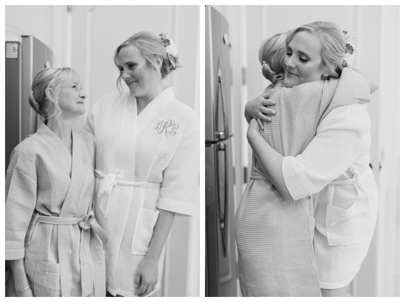Bride and mom get ready together on wedding day in black and white getting ready photo