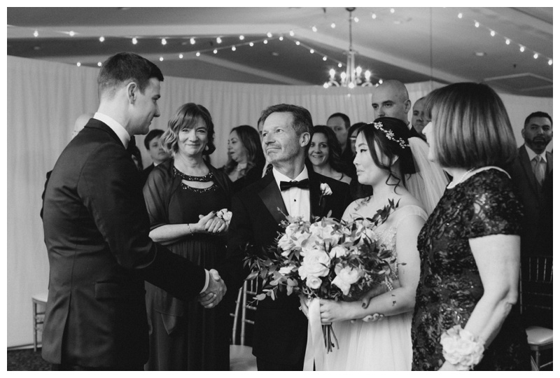 father gives bride away at The Inn at Longshore wedding ceremony