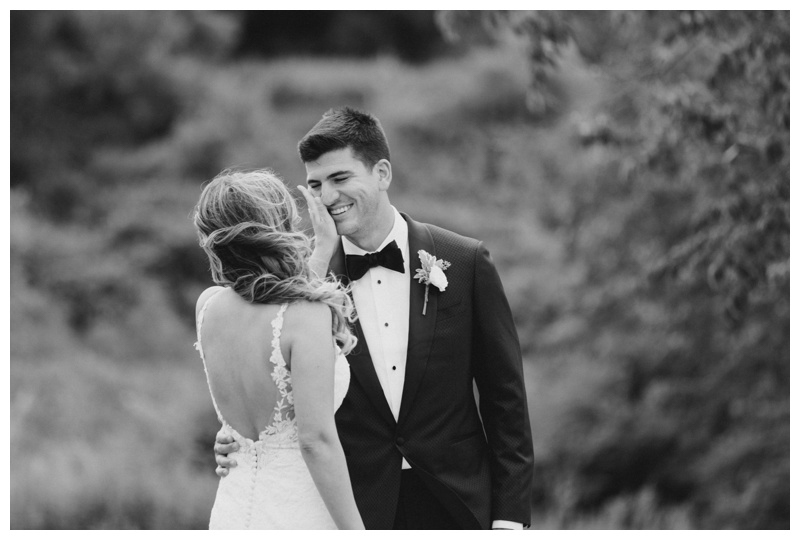 Black and white first look wedding photo at best outdoor wedding venue in NJ Bear Brook Valley captured by NJ wedding photographer Amy Rizzuto Photography